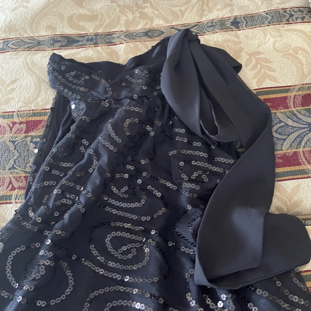 Vivid Karlie Ladies above the knee sleeveless dress in black with details.